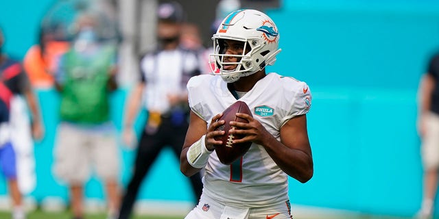 Miami Dolphins quarterback Tua Tagovailoa (1) looks to pass, during the first half of an NFL football game against the Los Angeles Rams, Sunday, Nov. 1, 2020, in Miami Gardens, Fla. (AP Photo/Wilfredo Lee)