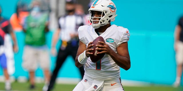 Miami Dolphins quarterback Tua Tagovailoa (1) looks to pass, during the first half of an NFL football game against the Los Angeles Rams, Sunday, Nov. 1, 2020, in Miami Gardens, Fla. (AP Photo/Wilfredo Lee)