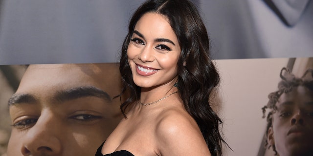Vanessa Hudgens stuck her "I voted" sticker to her phone case. (Getty Images)