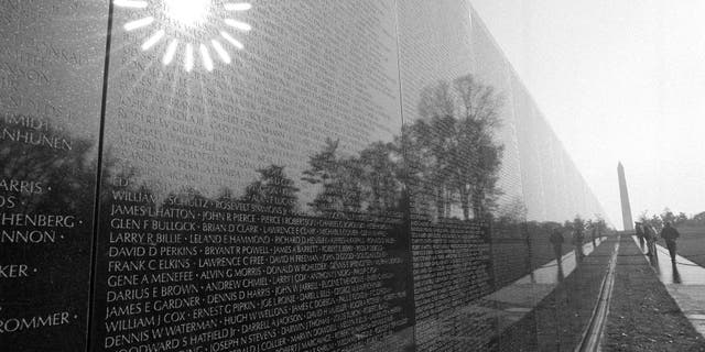 VietnamMemorial The morning sun reflects from the black marble walls of the Vietnam Veterans Memorial in Washington on Nov. 9, 1982. The memorial contains the names of more than 50,000 Americans killed or missing in the Vietnam conflict. (AP Photo/Bob Daugherty)