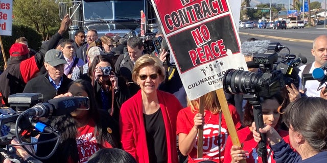 Democratic presidential candidate Sen. Elizabeth Warren of Massachusetts joins striking culinary union workers on the picket line in Las Vegas, Nev., in February 2020.