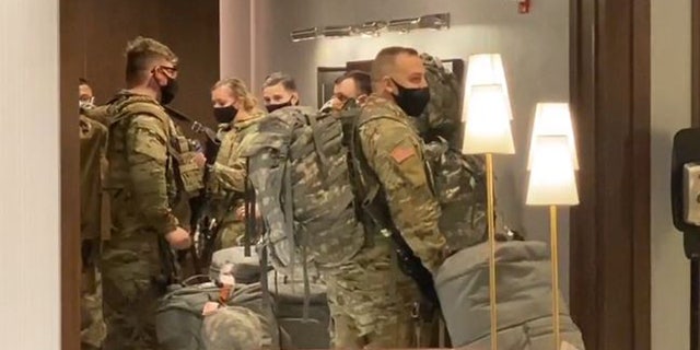 An undisclosed number of National Guard troops arrived in Chicago on Monday night in advance of any election-related civil unrest.