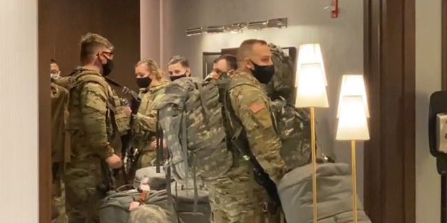 An undisclosed number of National Guard troops arrived in Chicago on Monday night in advance of any election-related civil unrest.