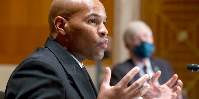 U.S. Surgeon General Jerome Adams appears before a Senate Health, Education, Labor, and Pensions Committee hearing to discuss vaccines and protecting public health during the coronavirus pandemic on Sept. 9, 2020, in Washington, D.C. (Michael Reynolds- Pool/Getty Images)