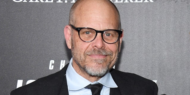 Alton Brown is pictured in 2019. He apologized Wednesday for tweeting about the Holocaust on Tuesday night. (Photo by Dimitrios Kambouris/Getty Images)