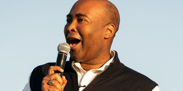 Democratic Senate candidate Jaime Harrison addresses supporters at a drive-in rally on October 17, 2020, in North Charleston, South Carolina. (Photo by Cameron Pollack/Getty Images)