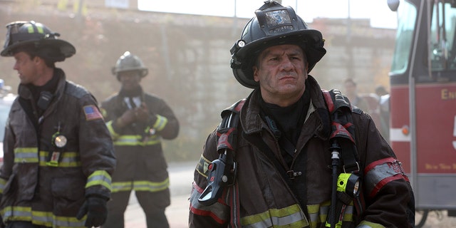 Pictured: (ld) Jesse Spencer as Matthew Casey, Eamonn Walker as Wallace, Anthony Ferraris as Tony in 'Chicago Fire'.  According to a new report, NBC halted filming of the show over the weekend after several members of the production team produced positive COVID-19 test results.  (Photo by: Adrian S. Burrows Sr./NBC/NBCU Photo Bank via Getty Images)