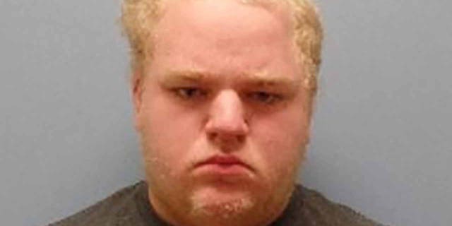 Colyn Tusing, 20, was charged with carrying a concealed weapon inside a Walmart store in the city of Sandusky. (Perkins Township Police Department)