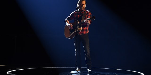 Dierks Bentley performs at the 54th Annual CMA Awards, hosted by Reba McEntire and Darius Rucker aired from Nashville's Music City Center.