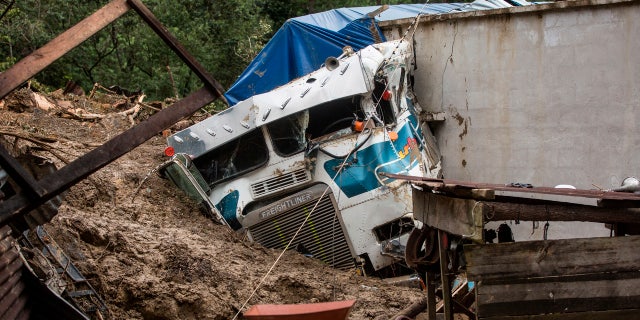 Part of her was buried in a massive rain-induced landslide in the village of Queja, in Guatemala, Saturday, November 7, 2020, as a result of Tropical Storm Eta.