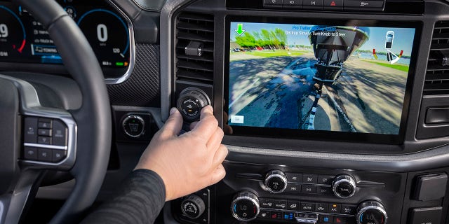 The 2021 F-150 also offers an optional Pro Trailer Backup Assist that steers the vehicle in reverse as the driver uses a knob on the dashboard to point it where it wants it to go.