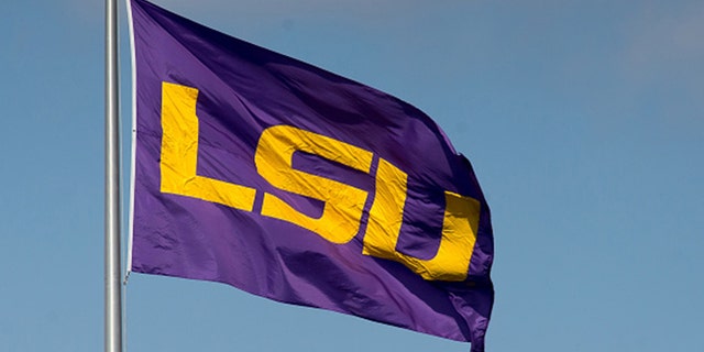 February 14, 2015 - The LSU flag is waved in the wind over Alex Box Stadium during the game between LSU and Kansas at Alex Box Stadium in Baton Rouge, Los Angeles.  LSU defeats Kansas 8-5.  (Photo by Stephen Low/Icon Sportswire/Corbis/Icon Sportswire via Getty Images)