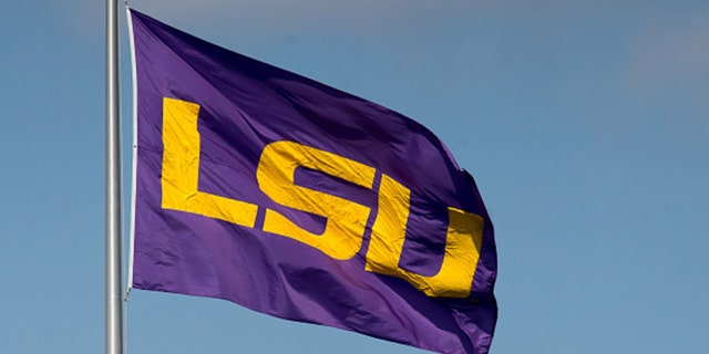 February 14, 2015 - LSU flag waving in the wind over Alex Box Stadium during the game between the LSU and Kansas at Alex Box Stadium in Baton Rouge, LA. LSU defeats Kansas 8-5. (Photo by Stephen Lew/Icon Sportswire/Corbis/Icon Sportswire via Getty Images)