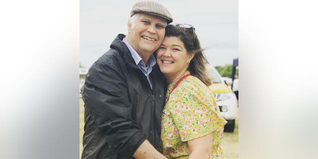 An old photo of Nina Ambrose with her father, Roger