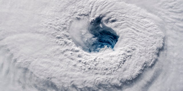 在这个九月. 12, 2018 photo provided by NASA, Hurricane Florence churns over the Atlantic Ocean heading for the U.S.