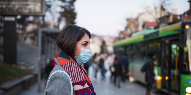 Those flouting masks over previous coronavirus infection and assumed immunity can still carry the virus and transmit it to others, doctors say. (iStock)