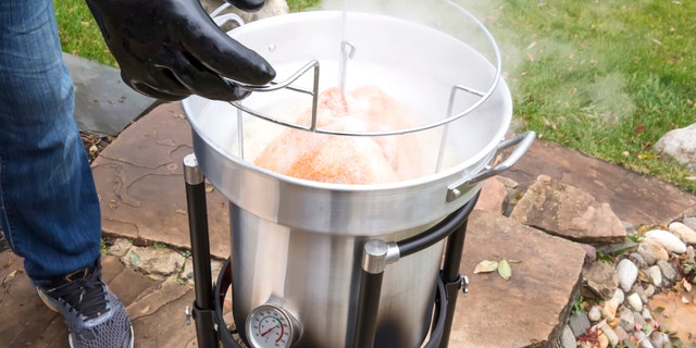 Once the oil gets hot, it’s easy for things to get messy. Don safety glasses, oven mitts and an apron to handle the fryer well before the oil starts to bubble.