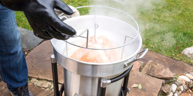 Once the oil gets hot, it’s easy for things to get messy. Don safety glasses, oven mitts and an apron to handle the fryer well before the oil starts to bubble.