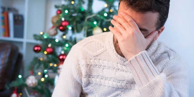 The genealogy company 23andMe commissioned a holiday survey that found Americans are struggling to have a jolly time throughout the COVID-19 pandemic. (iStock)