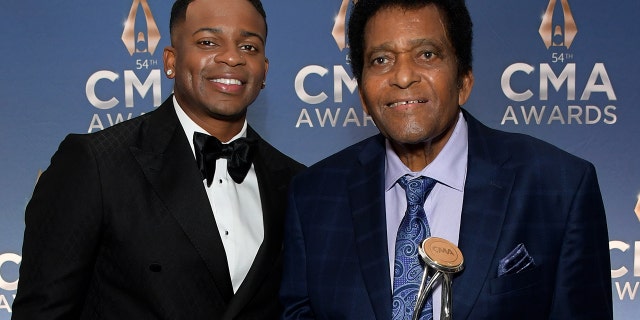 Jimmie Allen and Charley Pride at the 2020 CMA Awards. (Photo by Jason Kempin/Getty Images for CMA)