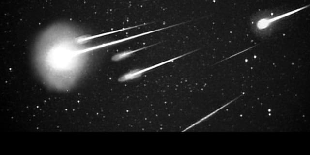 A burst of 1999 Leonid meteors as seen at 38,000 feet from Leonid Multi Instrument Aircraft Campaign (Leonid MAC) with 50 mm camera. (Credit: NASA/Ames Research Center/ISAS/Shinsuke Abe and Hajime Yano)