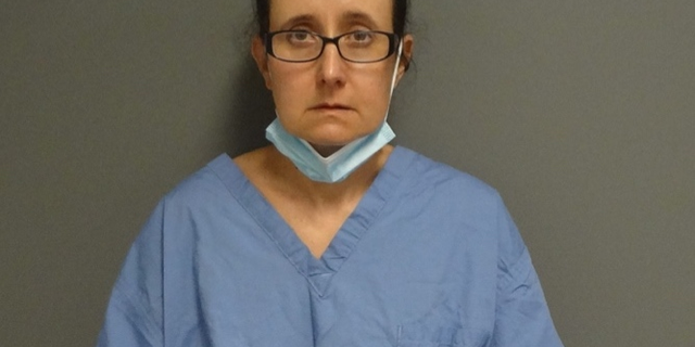 Mugshot for Naomi Bell, 43.