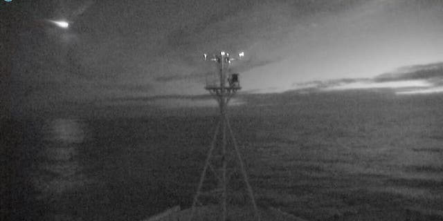 A still image from the video with the meteor at the top left.  Credit: CSIRO