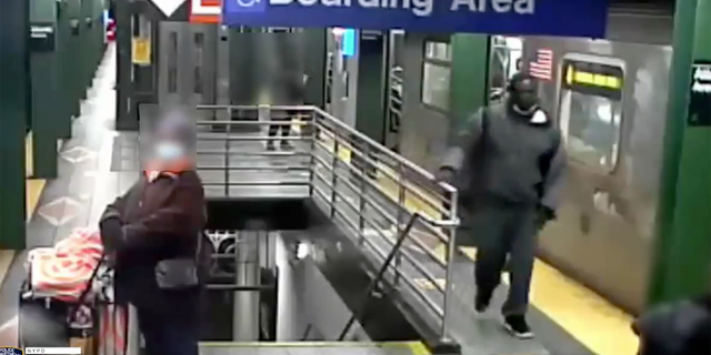 A photo shows the suspect wearing dark-colored clothing inside the Atlantic Avenue-Barclays Center (NYPD) subway station