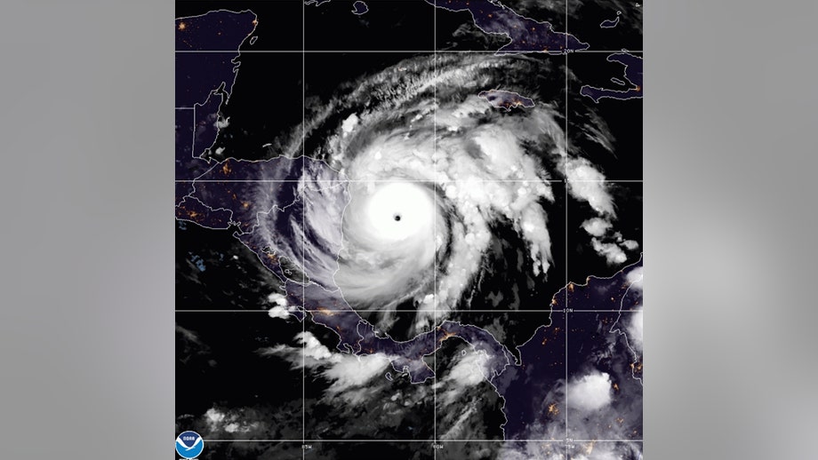 Hurricane Iota set for landfall, winter storms unsettle the West