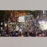 Protesters representing Black Lives Matter and Protect the Results march Wednesday evening, Nov. 4, 2020, in Seattle.