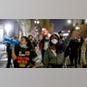 Protesters march in Los Angeles, Wednesday, Nov. 4, 2020, following Tuesday's elections.