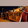 People protest in support of counting all votes in the Nevada vote in front of the Clark County Election Department, Wednesday, Nov. 4, 2020, in Las Vegas.