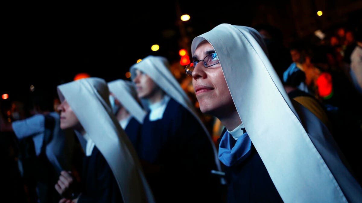 Nuns attend a demonstration against the decriminalization of abortion as lawmakers debate its legalization, outside Congress in Buenos Aires, Argentina, Tuesday, Dec. 29, 2020. (AP Photo/Marcos Brindicci)