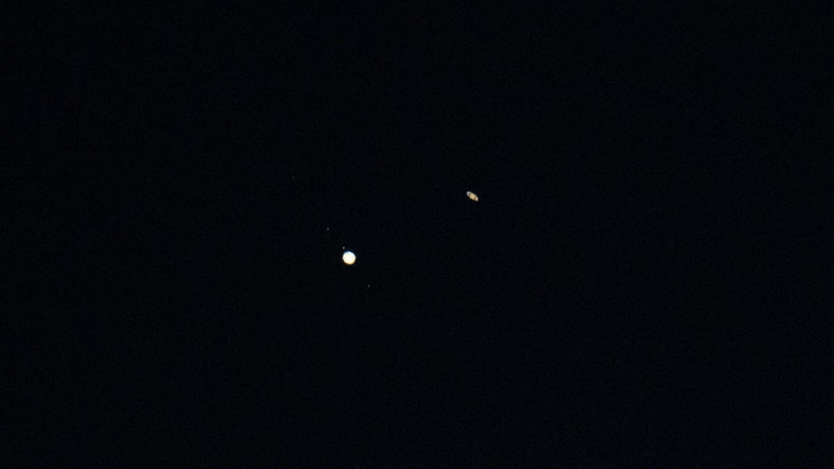 upiter, left, and Saturn, right, are seen during the "great conjunction" where the two planets appear a tenth of a degree apart from one another, Monday, Dec. 21, 2020, near Chapel Hill, North Carolina. Photo Credit: (NASA/Bill Ingalls)