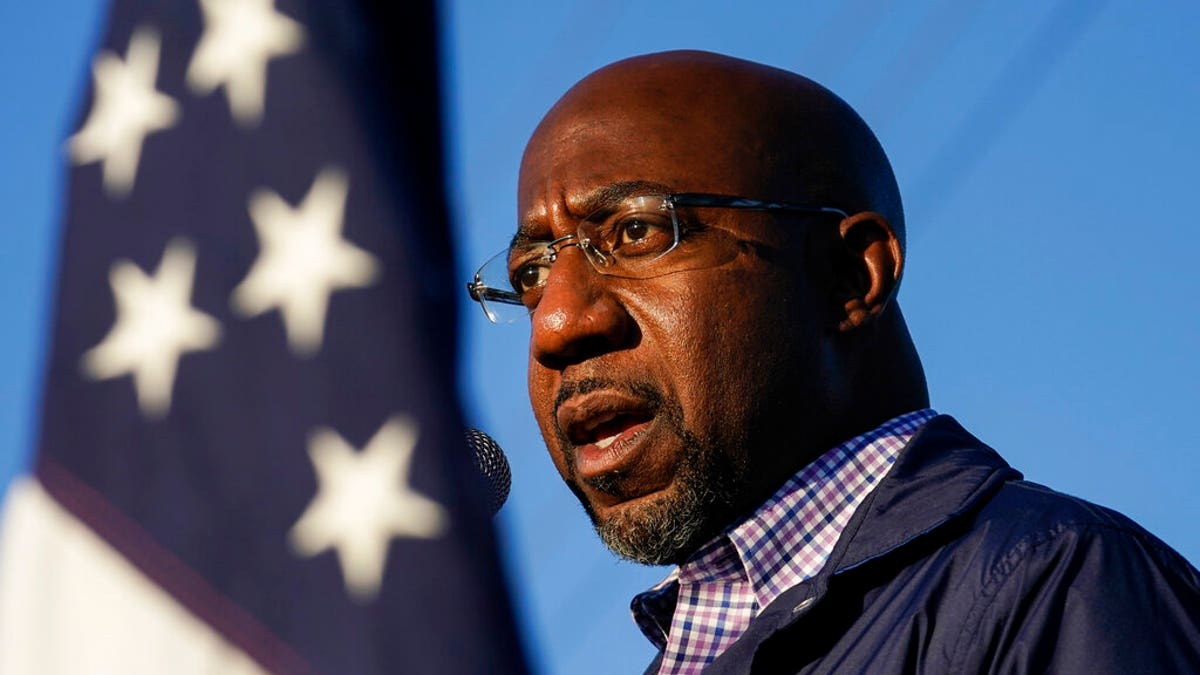 In this Nov. 15, file photo Raphael Warnock, a Democratic candidate for the U.S. Senate, speaks during a campaign rally in Marietta, Ga. Warnock and U.S. Sen. Kelly Loeffler are in a runoff election for the Senate seat. (AP Photo/Brynn Anderson, File)
