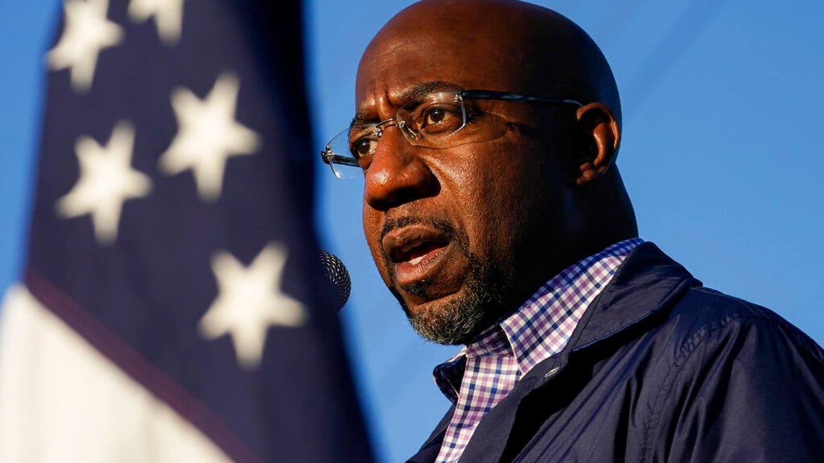 Raphael Warnock, a Democratic candidate for the U.S. Senate, speaks during a campaign rally in Marietta, Ga. Warnock and U.S. Sen. Kelly Loeffler are in a runoff election for the Senate seat. (AP Photo/Brynn Anderson, File)