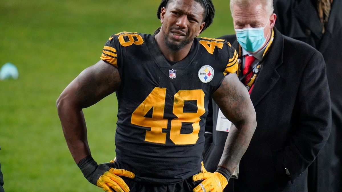 Then-Pittsburgh Steelers outside linebacker Bud Dupree grimaces as he walks on the sideline after being injured playing against the Baltimore Ravens during an NFL football game Wednesday, Dec. 2, 2020. (AP Photo/Gene J. Puskar)