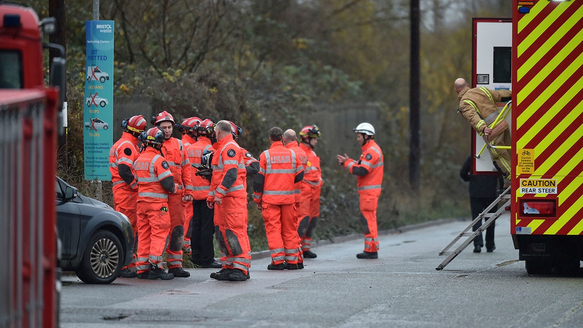 Emergency services attend to a large explosion at a warehouse in Bristol, England, Thursday Dec. 3, 2020. A local British emergency services department says there have been “multiple casualties” following a large explosion at a warehouse near the southwest England city of Bristol. (Ben Birchall/PA via AP)