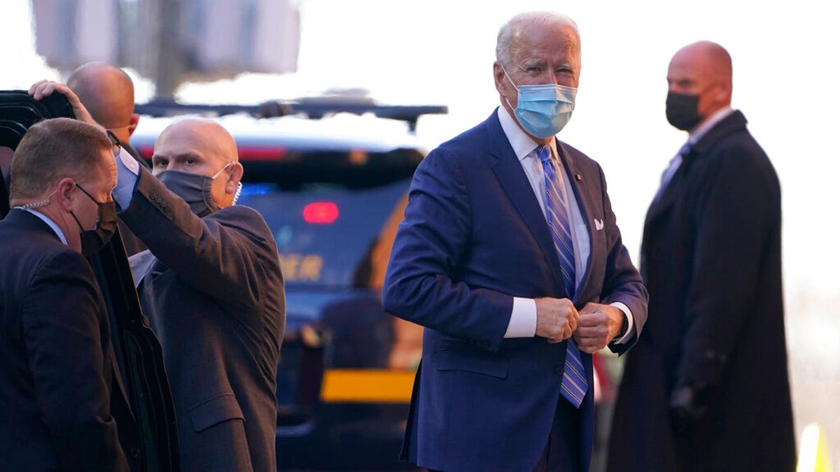 President-elect Joe Biden arrives at The Queen theater in Wilmington, Del., Monday, Dec. 7, 2020. (AP Photo/Susan Walsh)