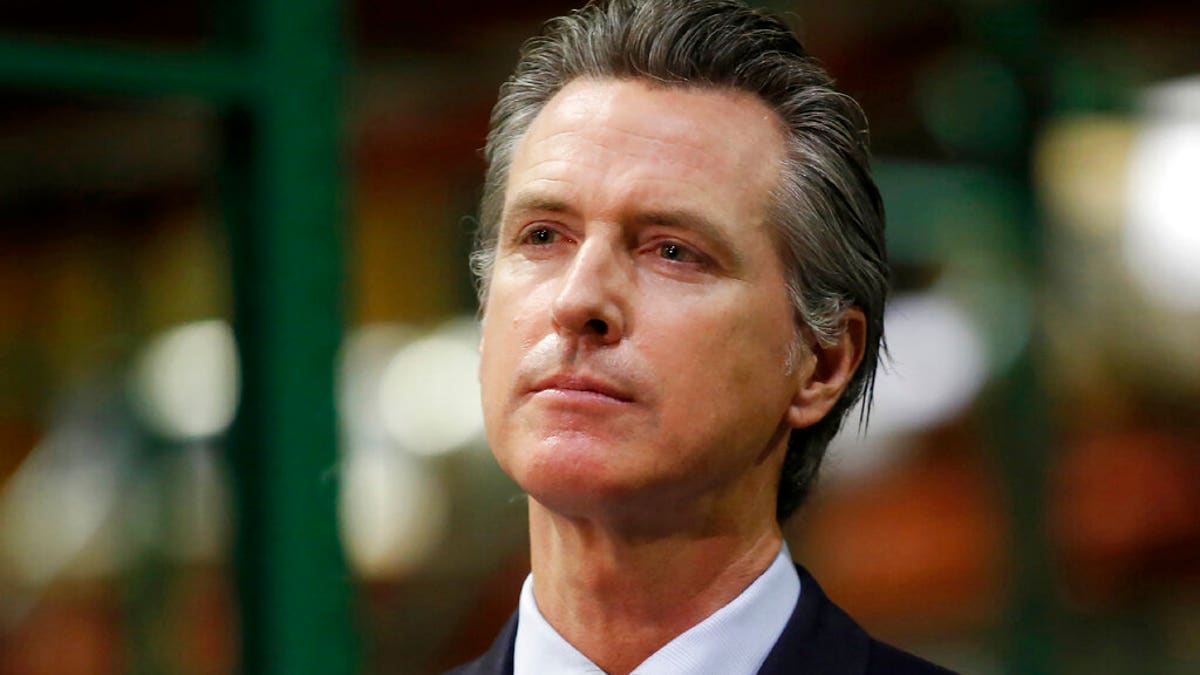 FILE - In this June 26, 2020, file photo, California Gov. Gavin Newsom listens to a reporter's question during a news conference in Rancho Cordova, Calif.?