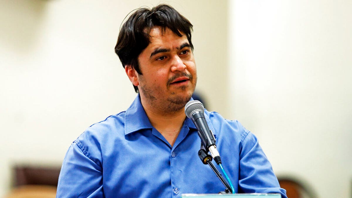 File - In this June 2, 2020 file photo, journalist Ruhollah Zam speaks during his trial at the Revolutionary Court, in Tehran, Iran.(Ali Shirband/Mizan News Agency via AP, File)