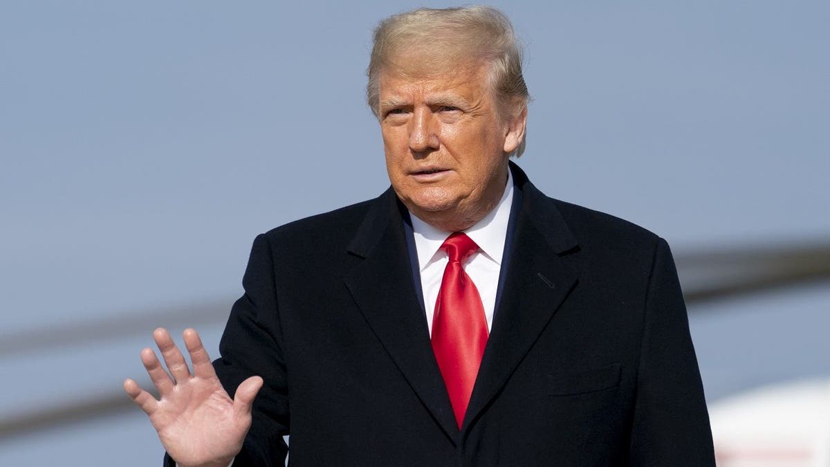 President Trump walks across the tarmac to board Air Force One at in Andrews Air Force Base, Maryland, Saturday, Dec. 12, 2020, to travel to Michie Stadium at the United States Military Academy to attend the 121st Army-Navy Football Game at West Point, New York. 