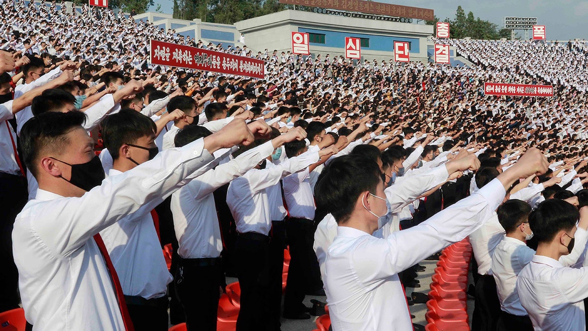 In this June 6, 2020, file photo, North Korean students stage a rally to denounce South Korea after defectors and other activists in South Korea flew anti-Pyongyang leaflets over the border, at the Pyongyang Youth Park Open-air Theatre in Pyongyang. (AP Photo/Cha Song Ho, File)