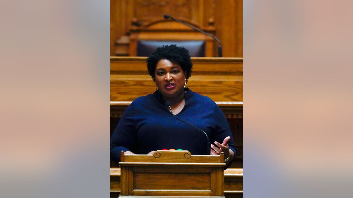 Democrat Stacey Abrams speaks before members of Georgia's Electoral College cast their votes at the state Capitol, Dec. 14, in Atlanta. (AP Photo/John Bazemore, Pool)