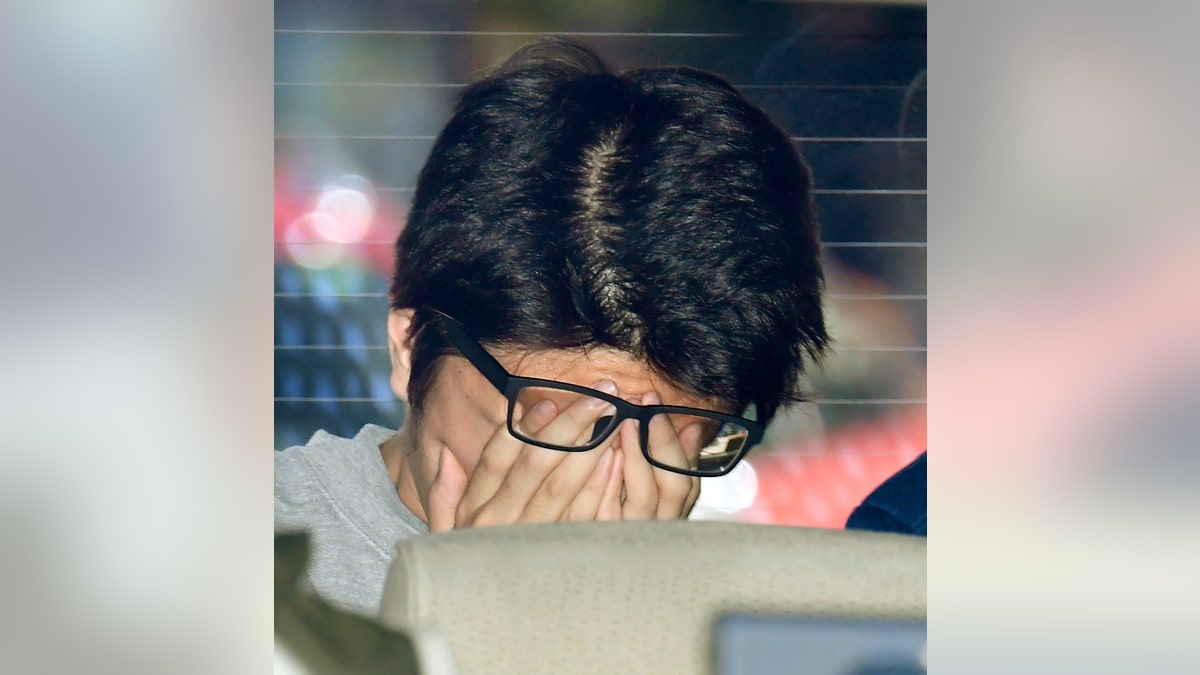 Takahiro Shiraishi arrives at a branch of Tokyo district public prosecutor's office in Tachikawa in November, 2017. (Masanobu Kumagai/Kyodo News via AP)