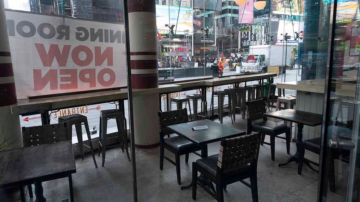 Dos Caminos restaurant is closed for indoor dining, Tuesday, Dec. 15, 2020, in New York. A ban on indoor dining at New York City restaurants was enacted Monday by officials trying to slow the resurgence of the coronavirus. (AP Photo/Mark Lennihan)