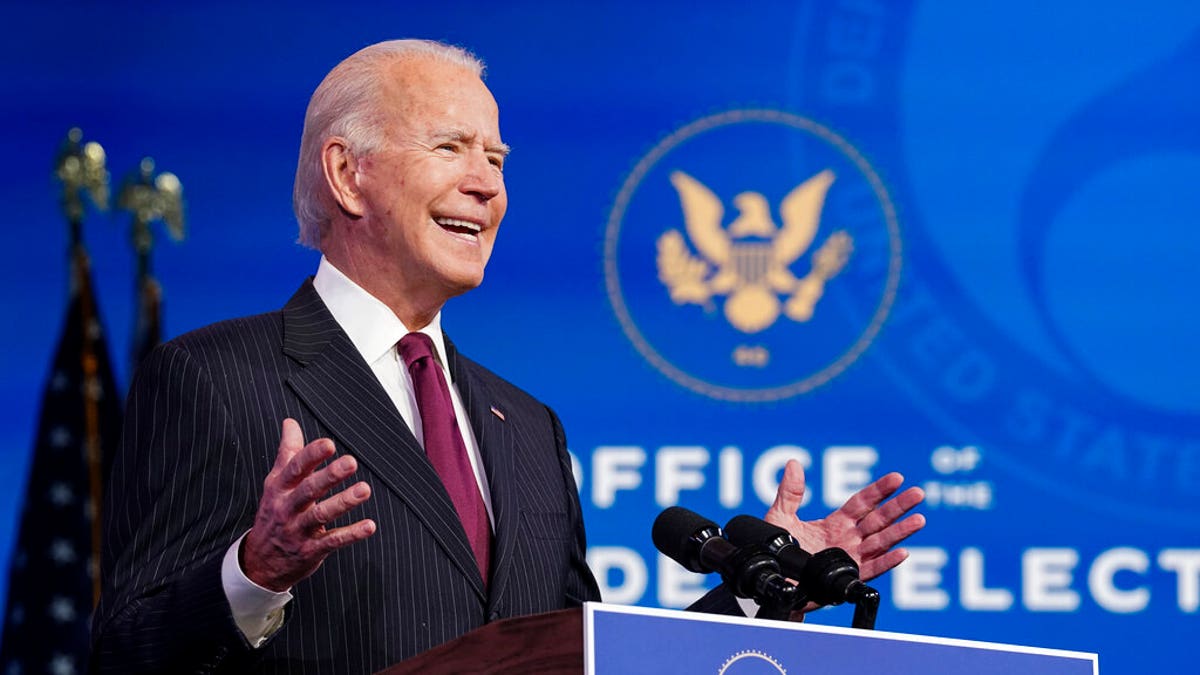 President-elect Joe Biden announces former South Bend, Ind. Mayor Pete Buttigieg as his nominee for transportation secretary during a news conference at The Queen Theater in Wilmington, Del.