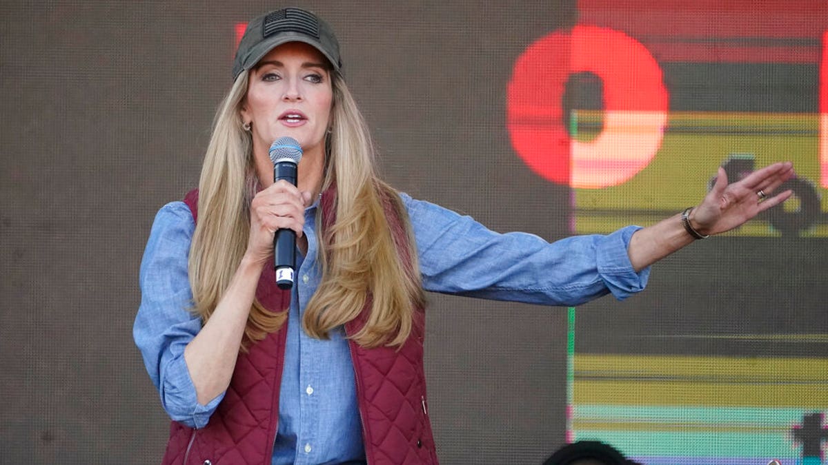 Sen. Kelly Loeffler, R-Ga., speaks during a campaign rally outside Adventure Outdoors gun store Friday, Dec. 18, 2020, in Smyrna, Ga. (AP Photo/John Bazemore)