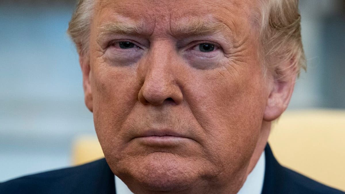 In this Jan. 27, 2020, file photo President Trump listens during a meeting with Israeli Prime Minister Benjamin Netanyahu in the Oval Office of the White House in Washington. (AP Photo/ Evan Vucci)