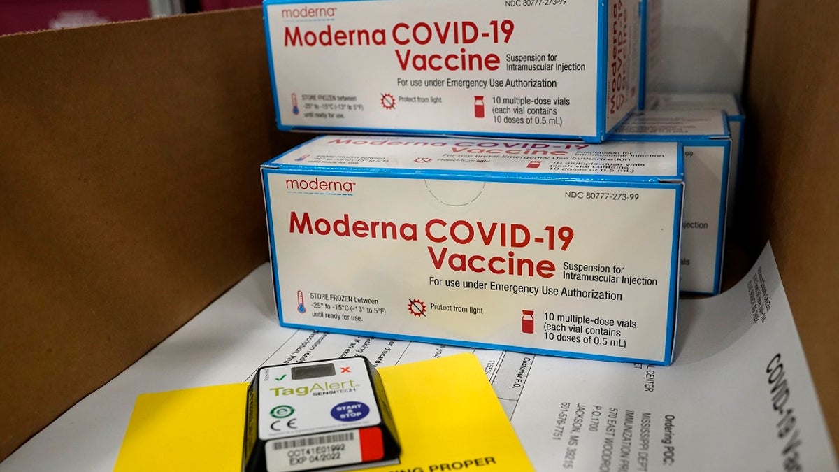 Boxes containing the Moderna COVID-19 vaccine are prepared to be shipped at the McKesson distribution center in Olive Branch, Miss., Sunday, Dec. 20, 2020. Some wealthy patients in Southern California have inquired about ways to jump the line in order to get the vaccine. (AP Photo/Paul Sancya, Pool)